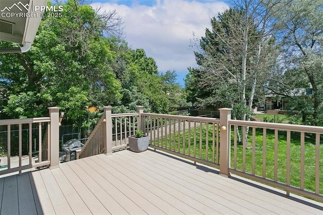 4603 Bella Dr, Colorado Springs, CO 80918 - deck with a lawn and view of scattered trees