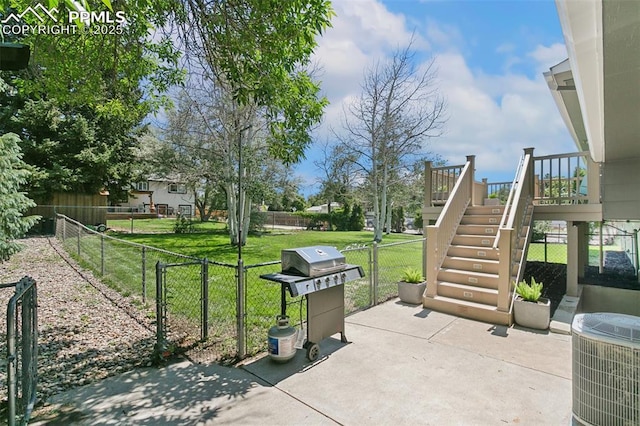 4603 Bella Dr, Colorado Springs, CO 80918 - fenced backyard with a grill, stairway, a patio, and a gate