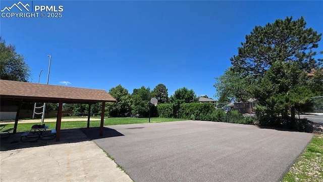 4603 Bella Dr, Colorado Springs, CO 80918 - view of patio / terrace featuring community basketball court