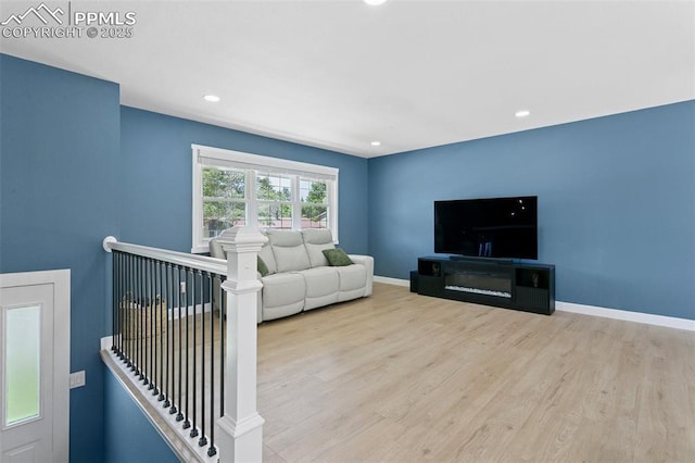 4603 Bella Dr, Colorado Springs, CO 80918 - living room featuring wood finished floors and recessed lighting