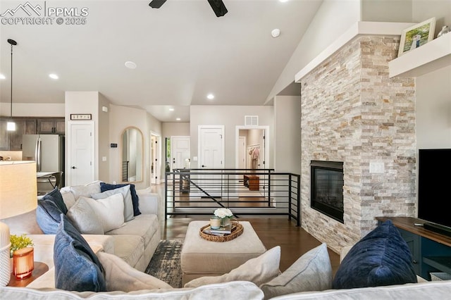 6792 David Anthony Ct, Colorado Springs, CO 80922 - living area with wood finished floors, ceiling fan, a stone fireplace, and recessed lighting