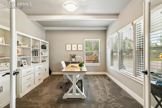 6792 David Anthony Ct, Colorado Springs, CO 80922 - office area featuring dark colored carpet and beam ceiling