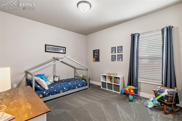 6792 David Anthony Ct, Colorado Springs, CO 80922 - carpeted bedroom with baseboards