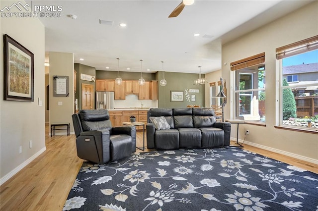 5763 Show Down Ln, Colorado Springs, CO 80923 - living room featuring light wood-type flooring, recessed lighting, and a ceiling fan