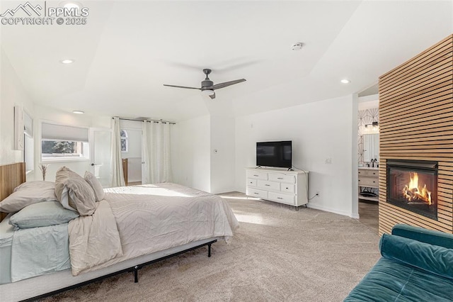 17870 New London Rd, Monument, CO 80132 - carpeted bedroom featuring a glass covered fireplace, recessed lighting, and ceiling fan
