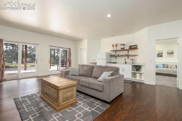 17870 New London Rd, Monument, CO 80132 - living room with dark wood finished floors and recessed lighting