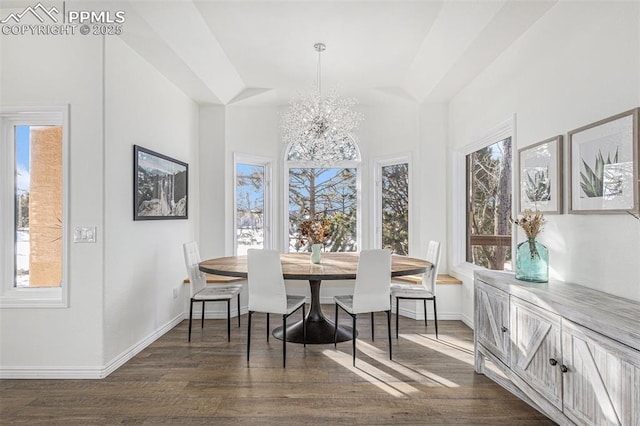 17870 New London Rd, Monument, CO 80132 - dining space featuring healthy amount of natural light, dark wood-type flooring, and a chandelier