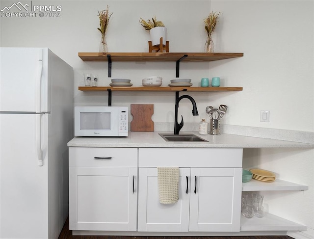 17870 New London Rd, Monument, CO 80132 - bar area featuring white appliances and a sink