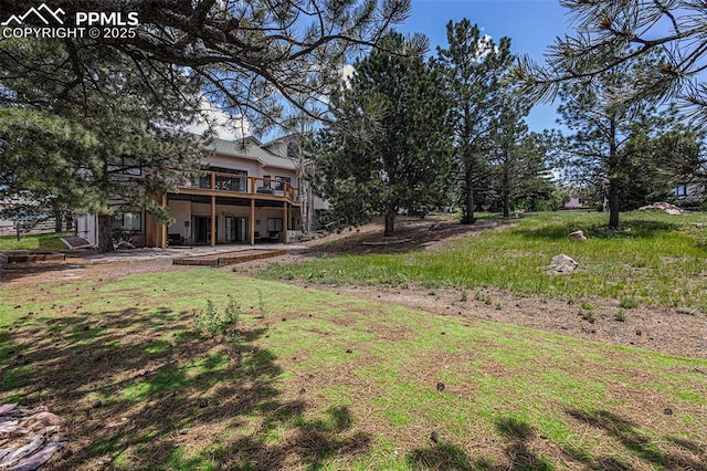 17870 New London Rd, Monument, CO 80132 - view of yard featuring a deck and a patio area