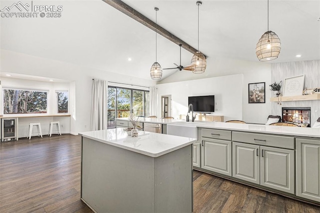 17870 New London Rd, Monument, CO 80132 - kitchen with open floor plan, gray cabinetry, a kitchen island, dishwasher, and wine cooler