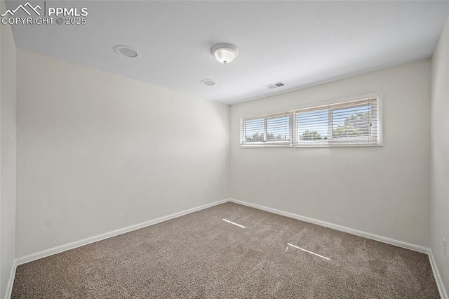 4703 N Weber St, Colorado Springs, CO 80907 - carpeted empty room with baseboards
