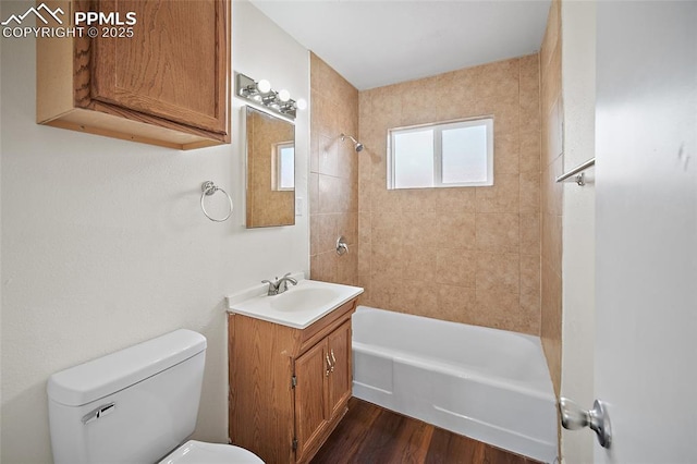 4703 N Weber St, Colorado Springs, CO 80907 - full bath featuring vanity, shower / tub combination, and wood finished floors