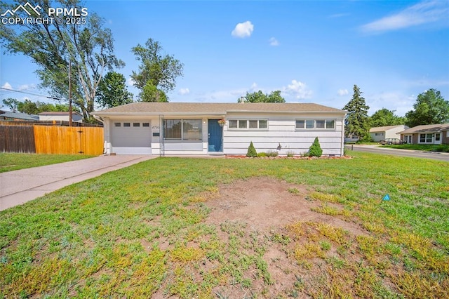 4703 N Weber St, Colorado Springs, CO 80907 - ranch-style house featuring driveway and a garage