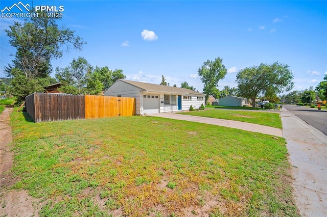 4703 N Weber St, Colorado Springs, CO 80907 - view of front of home with driveway and an attached garage