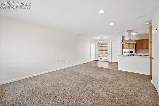 4703 N Weber St, Colorado Springs, CO 80907 - unfurnished living room featuring dark carpet and recessed lighting