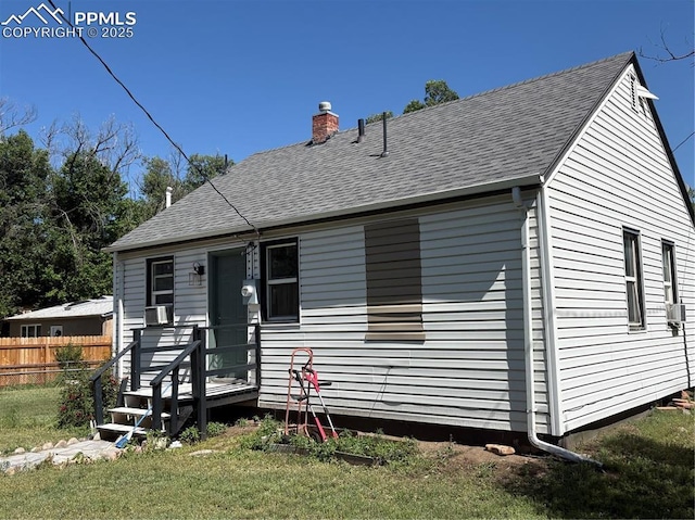 2453 E Willamette Ave Unit 1/2, Colorado Springs, CO 80909 - view of front of home with a chimney, a shingled roof, and cooling unit