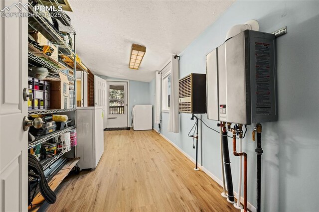 2925 M Path, Cotopaxi, CO 81223 - hallway featuring wood finished floors and a textured ceiling
