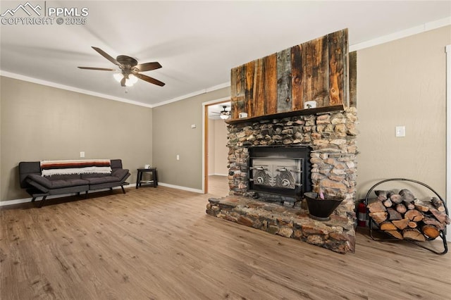 2925 M Path, Cotopaxi, CO 81223 - living area featuring ceiling fan, wood finished floors, and crown molding