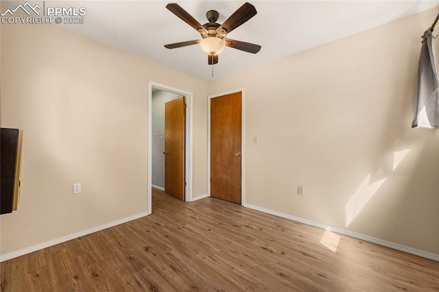 2925 M Path, Cotopaxi, CO 81223 - empty room featuring a ceiling fan and wood finished floors