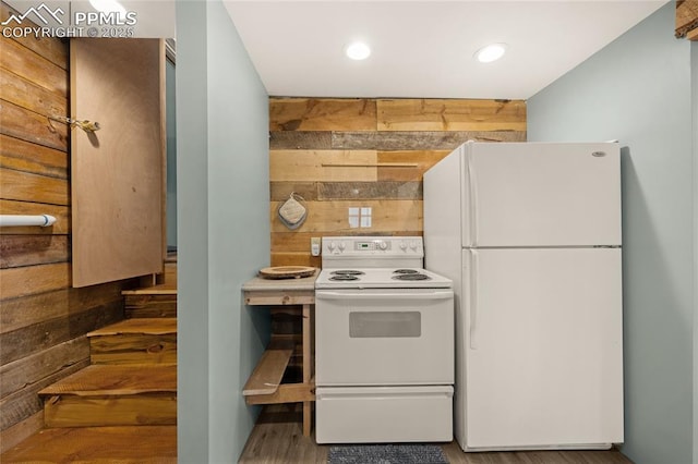 2925 M Path, Cotopaxi, CO 81223 - kitchen with white appliances, wooden walls, wood finished floors, and recessed lighting