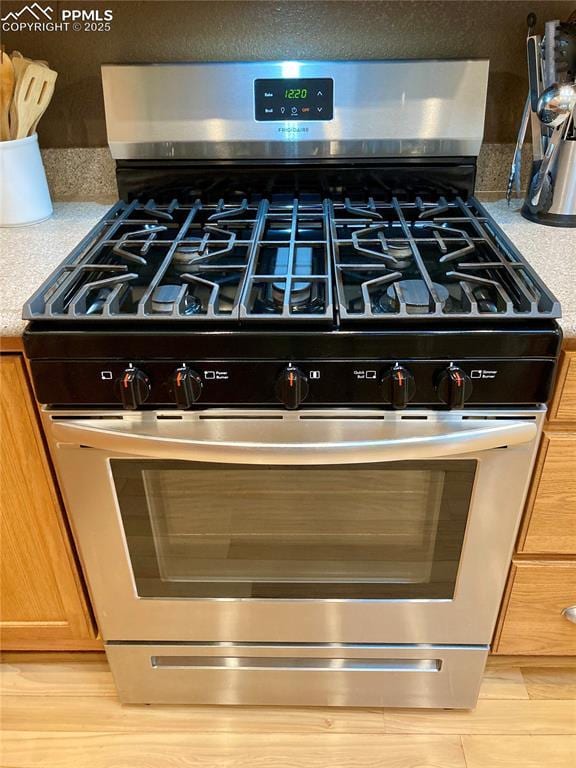 968 Samuel Pt, Colorado Springs, CO 80906 - kitchen view of stainless steel gas stove and light countertops
