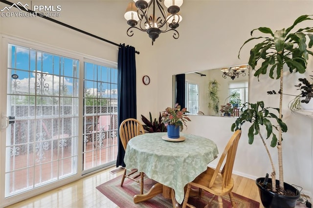 968 Samuel Pt, Colorado Springs, CO 80906 - dining room featuring a chandelier and wood finished floors