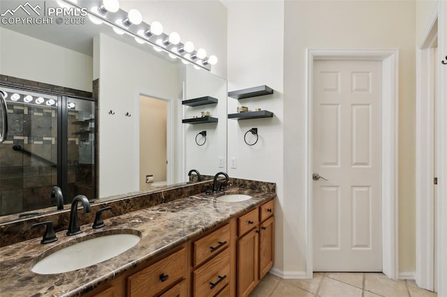 968 Samuel Pt, Colorado Springs, CO 80906 - full bathroom with tile patterned floors, double vanity, and a stall shower