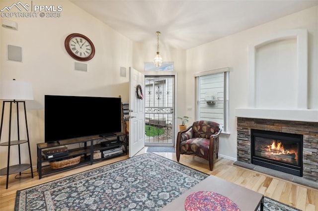 968 Samuel Pt, Colorado Springs, CO 80906 - living room featuring wood finished floors and a fireplace