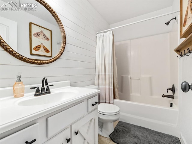 1205 N Picketwire Ln, Pueblo West, CO 81007 - bathroom with vanity, shower / bath combination with curtain, tile patterned floors, and wood walls