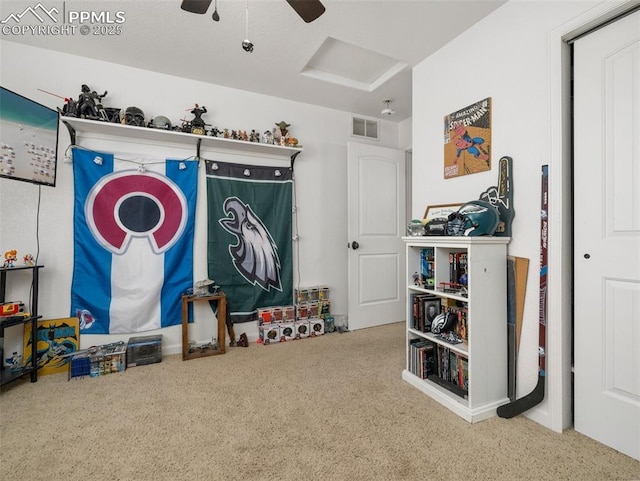 1205 N Picketwire Ln, Pueblo West, CO 81007 - bedroom with carpet floors, attic access, and ceiling fan