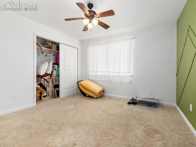 1205 N Picketwire Ln, Pueblo West, CO 81007 - unfurnished bedroom featuring carpet flooring, a closet, and a ceiling fan