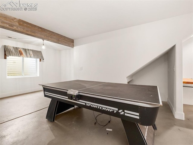 1205 N Picketwire Ln, Pueblo West, CO 81007 - misc room with concrete floors and beamed ceiling
