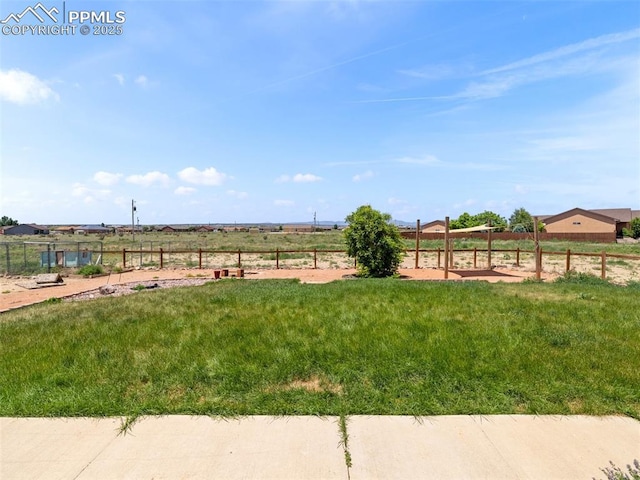 1205 N Picketwire Ln, Pueblo West, CO 81007 - view of yard with a vegetable garden
