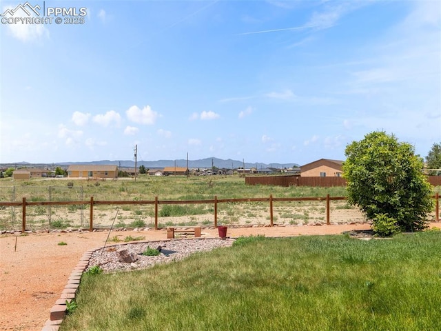 1205 N Picketwire Ln, Pueblo West, CO 81007 - view of yard featuring a view of countryside and a garden