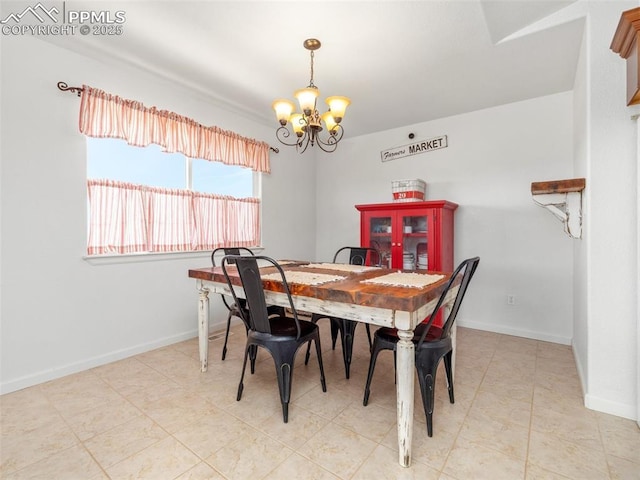 1205 N Picketwire Ln, Pueblo West, CO 81007 - dining room with a chandelier and light tile patterned floors