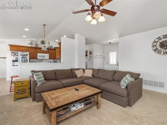 1205 N Picketwire Ln, Pueblo West, CO 81007 - living area featuring lofted ceiling, ceiling fan, recessed lighting, and light carpet