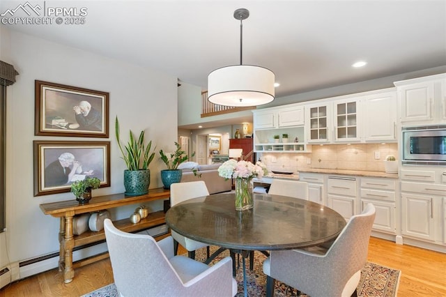 155 Grayson Ct, Colorado Springs, CO 80906 - dining area with light wood-style flooring and recessed lighting