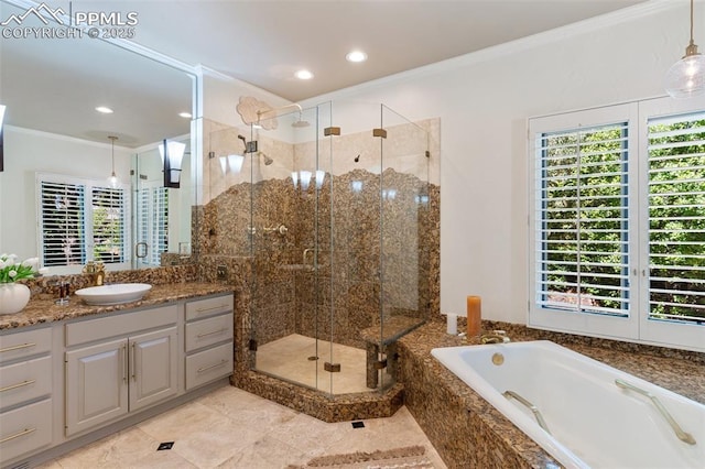 155 Grayson Ct, Colorado Springs, CO 80906 - full bathroom with vanity, a garden tub, ornamental molding, a shower stall, and recessed lighting