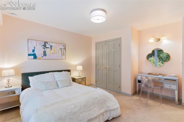 155 Grayson Ct, Colorado Springs, CO 80906 - carpeted bedroom featuring a closet and baseboards