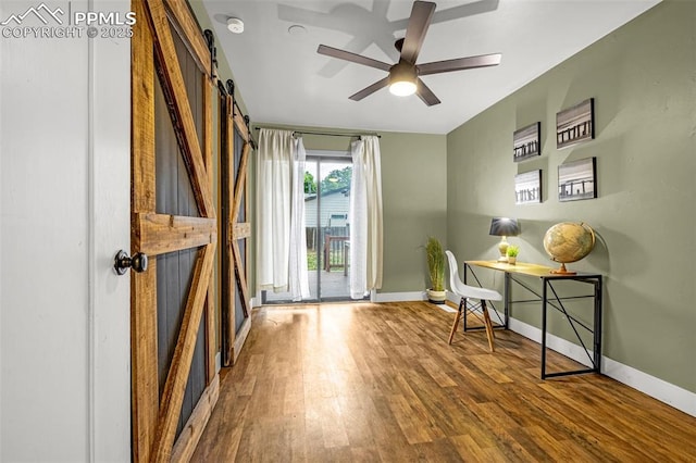 601 N 15th St, Canon City, CO 81212 - office space featuring a barn door, wood finished floors, and ceiling fan