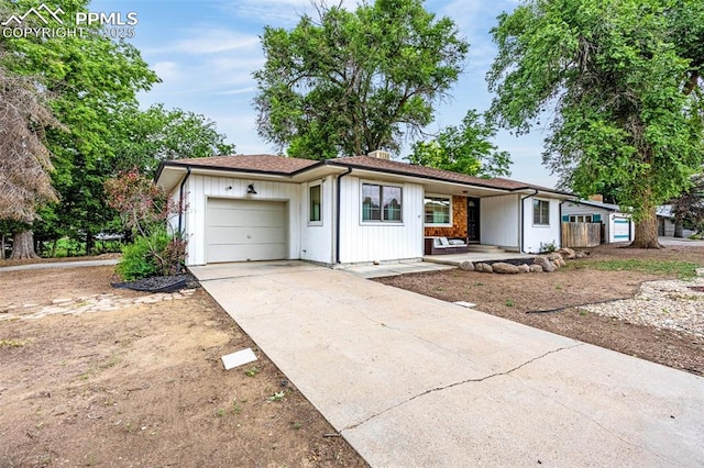 601 N 15th St, Canon City, CO 81212 - ranch-style home featuring a garage, driveway, and a porch