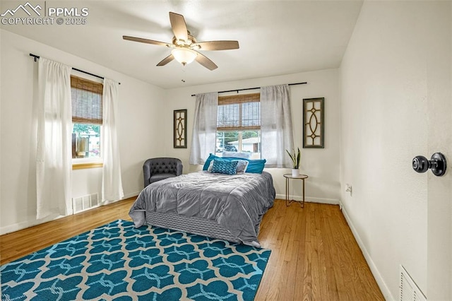 601 N 15th St, Canon City, CO 81212 - bedroom featuring wood finished floors and a ceiling fan