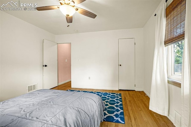 601 N 15th St, Canon City, CO 81212 - bedroom featuring light wood finished floors and ceiling fan