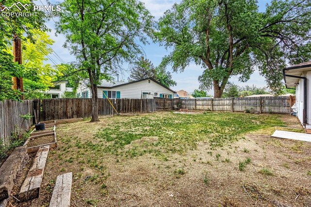 601 N 15th St, Canon City, CO 81212 - fenced backyard featuring a garden