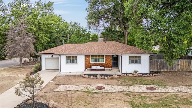 601 N 15th St, Canon City, CO 81212 - ranch-style house featuring a garage, an outdoor living space, and driveway