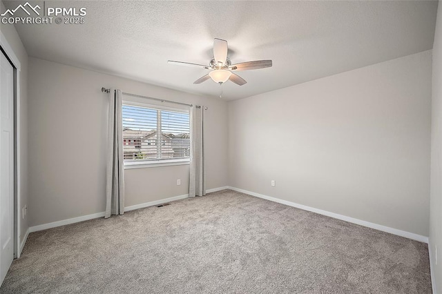 4928 Wolf Moon Dr, Colorado Springs, CO 80911 - carpeted empty room with a ceiling fan and a textured ceiling