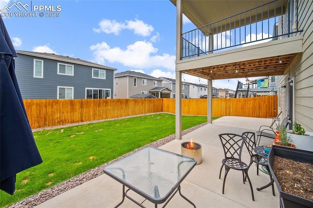 4928 Wolf Moon Dr, Colorado Springs, CO 80911 - fenced backyard featuring a patio, a residential view, and a fire pit