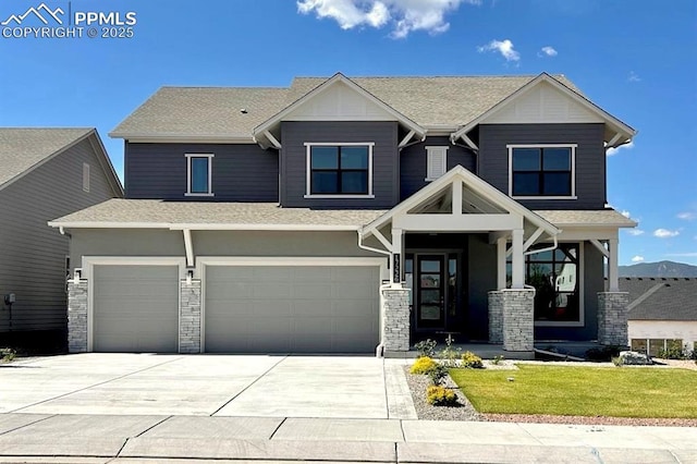 17226 Alsike Clover Ct, Monument, CO 80132 - craftsman inspired home featuring a front yard, driveway, an attached garage, and a shingled roof