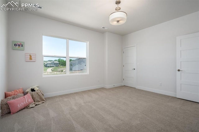 17226 Alsike Clover Ct, Monument, CO 80132 - unfurnished bedroom featuring light carpet and baseboards