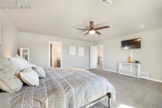 4631 Zircon Dr, Colorado Springs, CO 80938 - carpeted bedroom with a ceiling fan, ensuite bathroom, and radiator heating unit